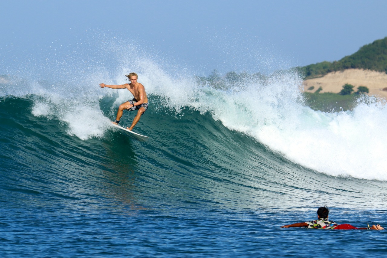 Learn to do a 360 on a surfboard 