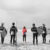 Surf Instructor with students at Muizenberg Beach, South Africa.
